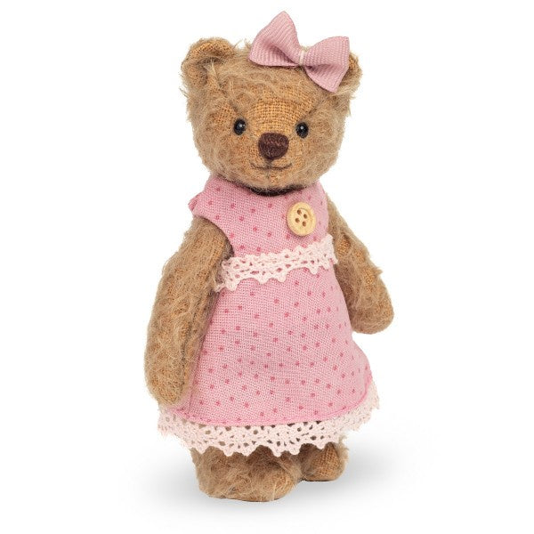 Beautiful Betti is made from soft and slightly sparse blond coloured mohair. She is able to stand unaided and she wears a pretty pink spotty dress decorated with a tiny button and lace.  limited edition of 300 pieces worldwide