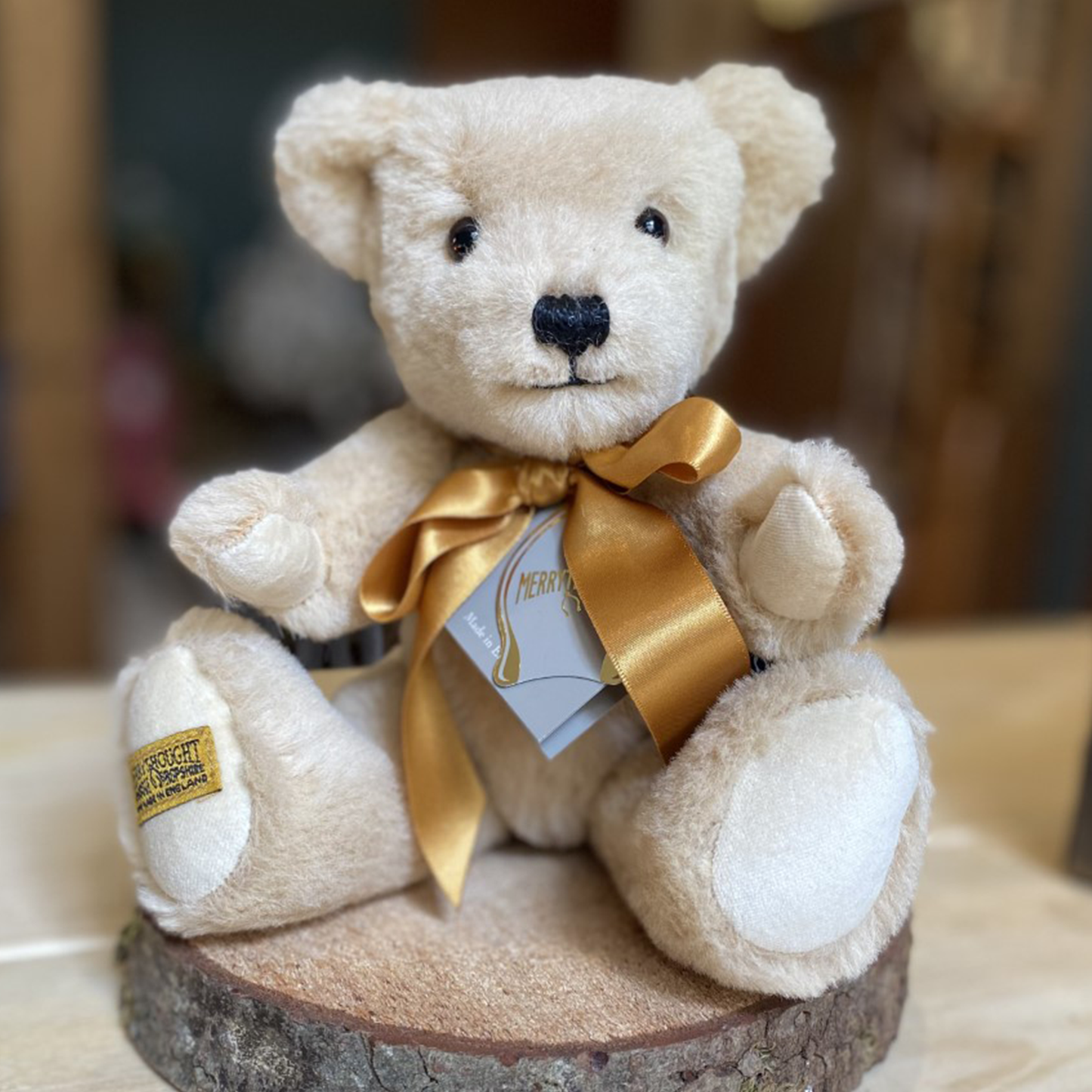 A classically designed teddy bear crafted from the finest pale gold alpaca, Stratford stands out as something rather special. Cream pure cotton velvet paws combine to give an overall softness that ensures this bear is impossible to put down, his colours beautifully enhanced by a striking copper-gold satin bow to finish.