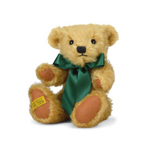 With a sweet smile and truly timeless design, Shrewsbury is a teddy bear for all the family to enjoy. Handmade from the softest golden mohair, with chestnut-brown pure wool felt paws and a satin ribbon in British racing green, he rivals 'London Gold' as Merrythought’s most popular traditional bear